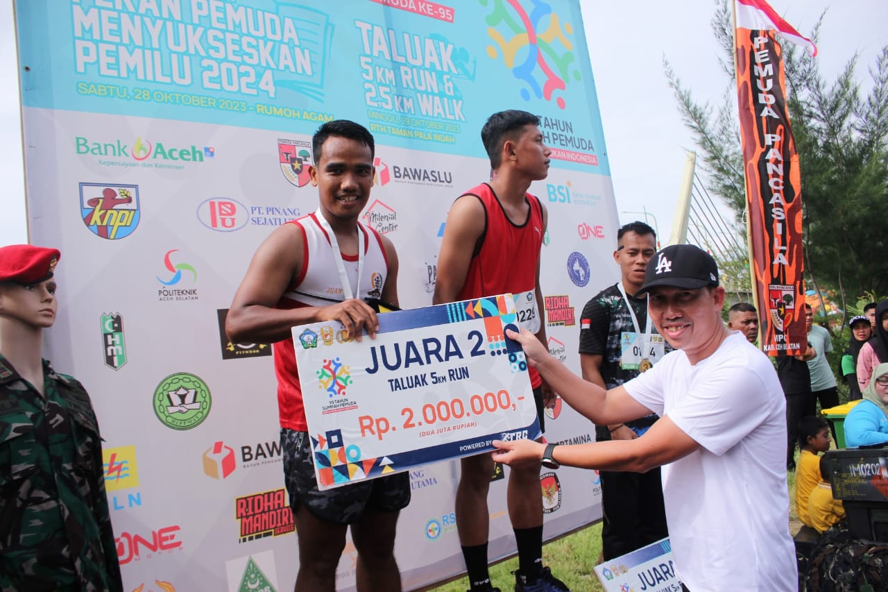 Prajurit Kodim 0107/Asel Raih Juara Ke II  Ajang Perlombaan Lari 5 K Dalam Acara Memeriahkan Hari Sumpah Pemuda ke 95 di Kabupaten Aceh Selatan